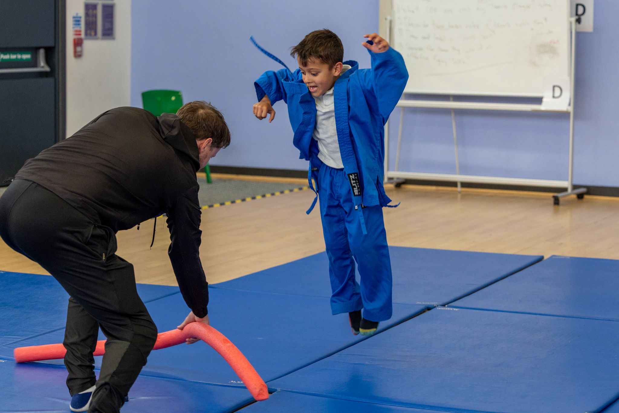 Coach Jimmy teaching a class